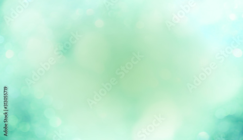 abstract background with bokeh -Spring nature background concept - beautiful green - blue blurred bokeh lights - or christmas background
