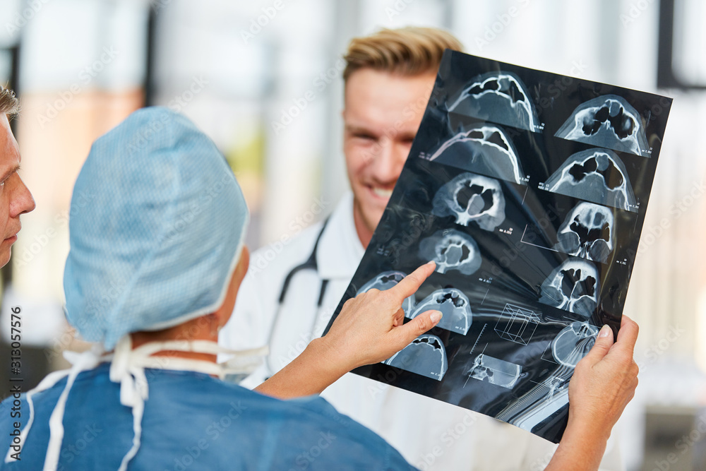 Radiologists discuss findings on the MRI Stock Photo | Adobe Stock