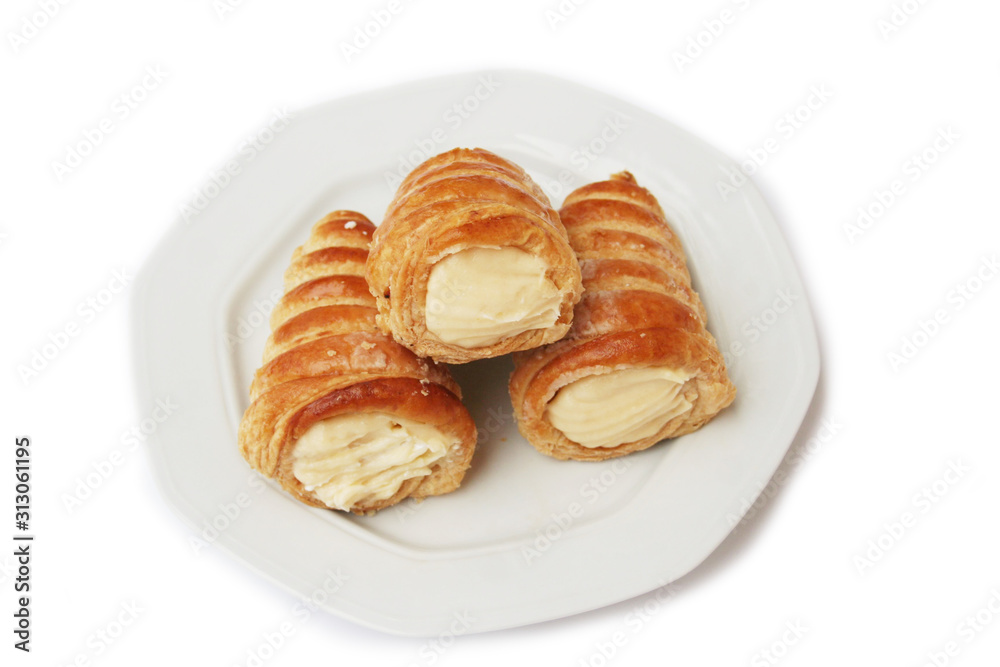 Italian traditional pastry called Cannolo filled with cream isolated on white background