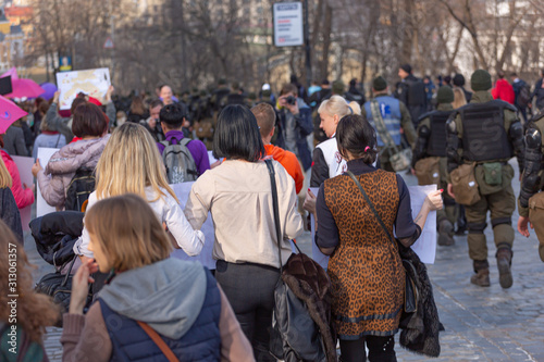 Peaceful demonstration of people in a modern city.