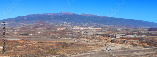 Aerial view on huge green houses at the foot of the volcanic mountain Teide (Tenerife, Spain) photo