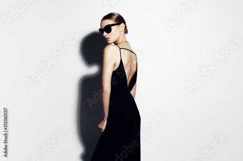 fashion portrait of beautiful model with sunglasses