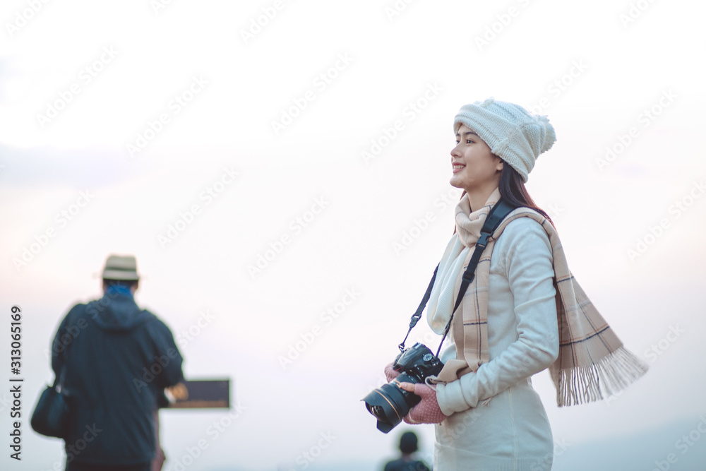 Women are happy to take travel at the mountains with fog. Women are photographer, have fair lighting or over sunlight. Women are happy to take travel at the mountains with fog. Women are photographer, have fair lighting or over sunlight.