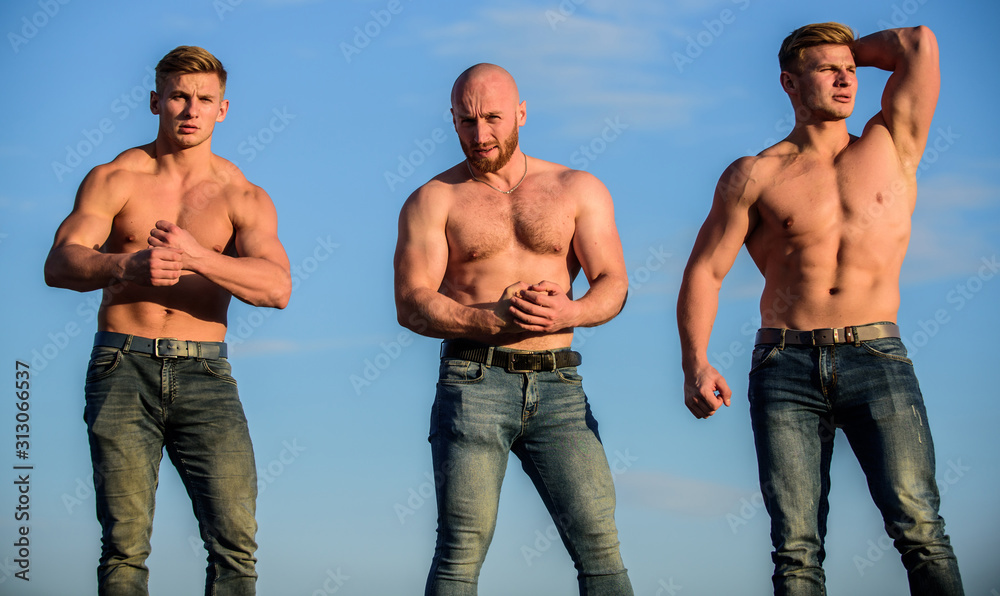 full of energy. Inspiring better health. three muscular men sky. athletic  bodybuilders. sport concept. Sexy men with muscular body. Brutal macho.  Strong men are sexy. showing abs and biceps foto de Stock