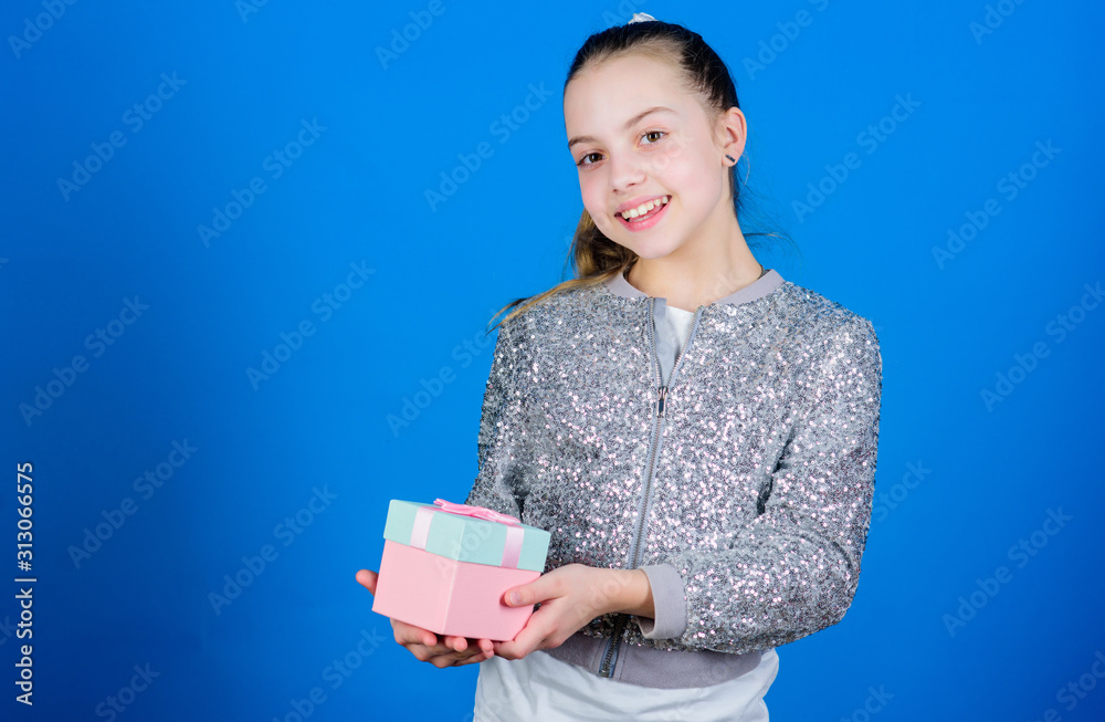 Girl with gift box blue background. Black friday. Shopping day. Cute adorable child carry gift box. Surprise gift box. Birthday wish list. World of happiness. Special happens every day. My precious Girl with gift box blue background. Black friday. Shopping day. Cute adorable child carry gift box. Surprise gift box. Birthday wish list. World of happiness. Special happens every day. My precious