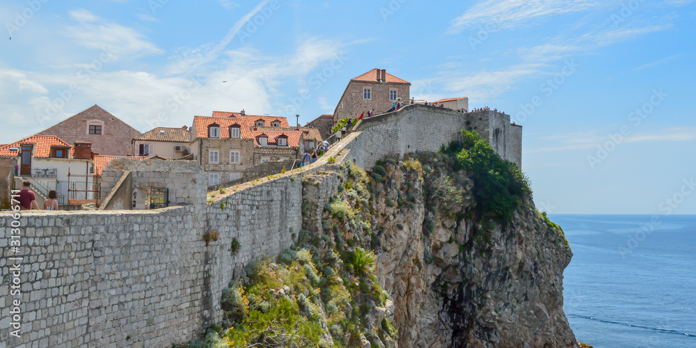 DUBROVNIK, CROATIA - JUNE 18: Walking on walls of town Dubrovnik on June 18, 2019. 