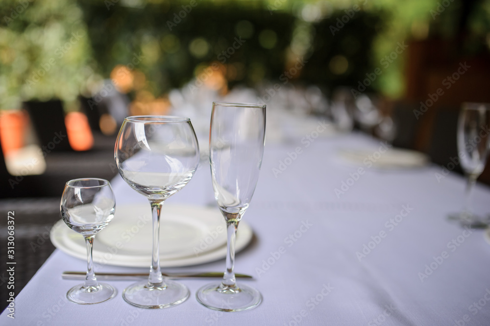 close up photo of arranged table at a terrace for a party close up photo of arranged table at a terrace for a party
