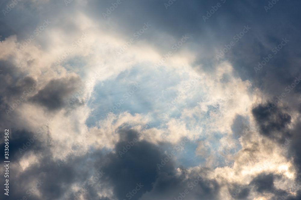  bright sky with clouds and glare from the sun's rays