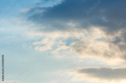 Fototapeta Naklejka Na Ścianę i Meble -  texture of the sky clouds and rays of sun on a background