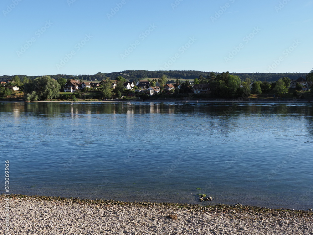 Scenic Rhine River landscape near european STEIN am RHEIN town in SWITZERLAND in swiss canton of Schaffhausen