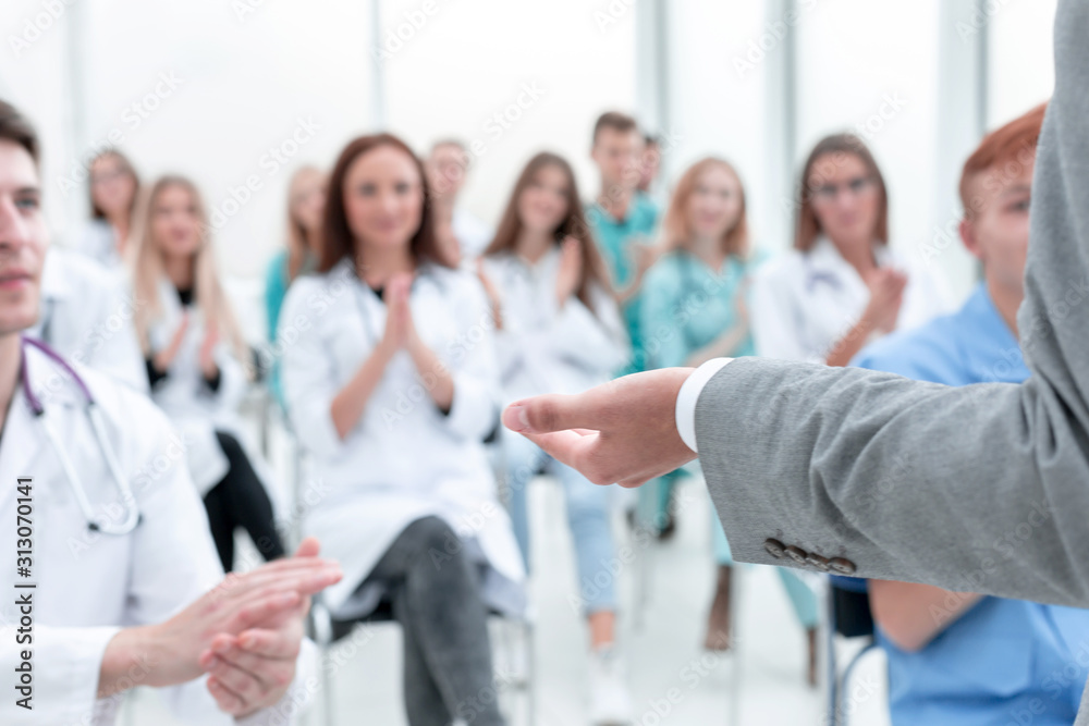 top view. a group of smiling doctors pointing at you. top view. a group of smiling doctors pointing at you.