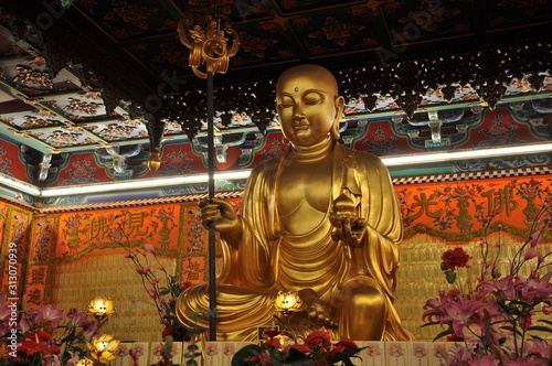 Canvas Print buddha statues in golden color