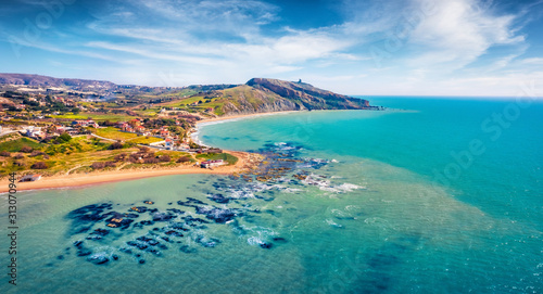 View from flying drone. Incredible morning view of Giallonardo Beach. Fantastic spring seascape of Mediterranean sea, Sicily, Italy, Europe. Traveling concept background. © Andrew Mayovskyy