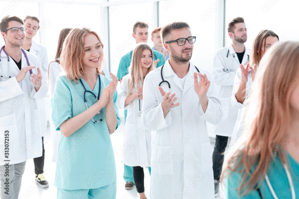 confident group of medical professionals stepping forward confident group of medical professionals stepping forward