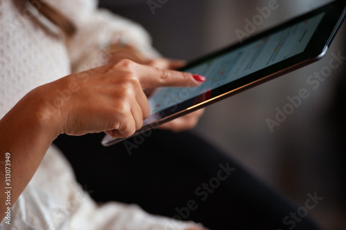 Woman works on tablet