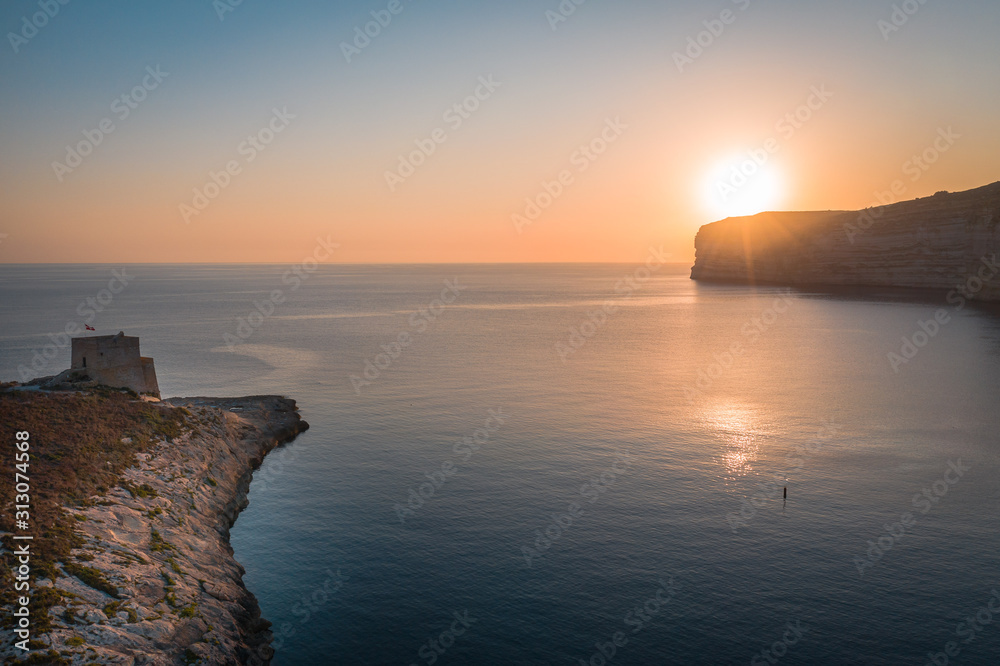 Sunset of the Cliffs of Xlendi Bay Sunset of the Cliffs of Xlendi Bay