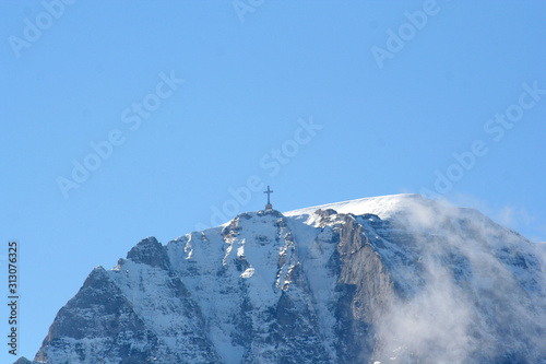 Bucegi Cross - Crucea Bucegi Romania with snow and ice photo