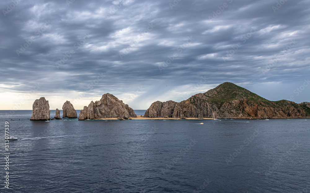 Aerial view of El Arco, at Cabo San Lucas. Rocky outcrops featuring a natural arch, are one of the most famous natural attractions of Mexico Aerial view of El Arco, at Cabo San Lucas. Rocky outcrops featuring a natural arch, are one of the most famous natural attractions of Mexico