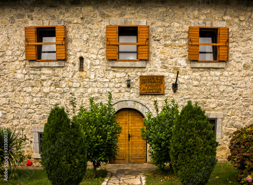 Fototapeta Naklejka Na Ścianę i Meble -  The Library, courtyard, the belfry and the church of  Assumption of Mary in Serbian Orthodox monastery (cloister) Moracha in Montenegro, founded in 1252,  Rascian architectural style, frescoes