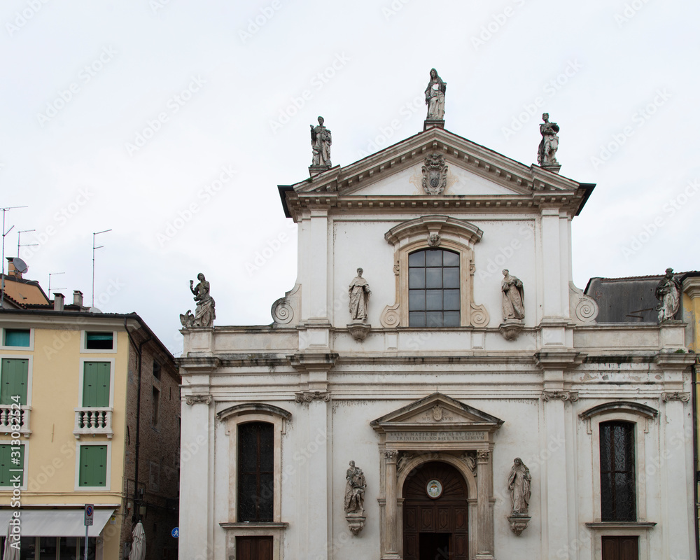 Facade of the church of Santa Maria in Foro called Dei Servi in Vicenza, Italy. Made in 1710 with stone moldings and capitals, with nine statues made by Angelo and Orazio Marinali and Giovanni Calvi.