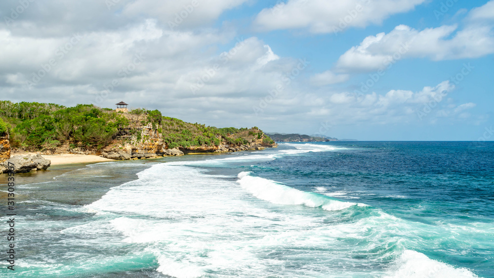 Beautiful view of rocky beach of Kukup Beach, Gunung Kidul, yogyakarta, Indonesia Beautiful view of rocky beach of Kukup Beach, Gunung Kidul, yogyakarta, Indonesia