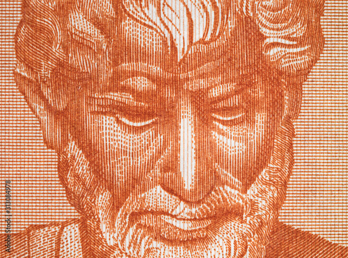 Aristotle portrait on old Greece drachma banknote close up macro. Genius Ancient Greek philosopher, Father of Western Philosophy. Vintage engraving. photo