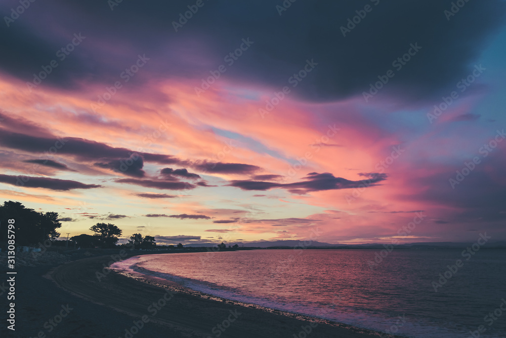 Sunset on the beach, New Zealand