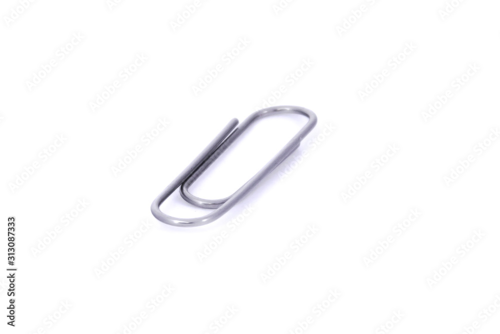 one metal clip isolated on the white background one metal clip isolated on the white background