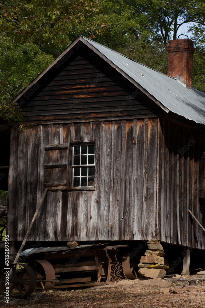 Weathered Wooden building with a window Weathered Wooden building with a window