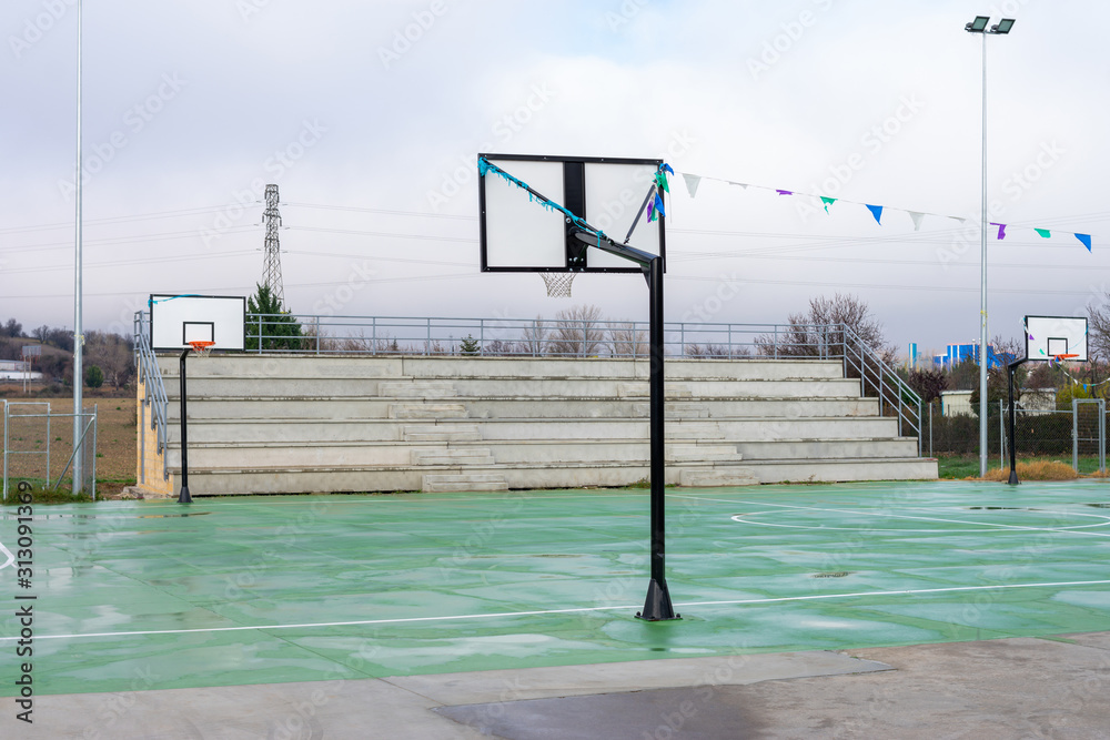 street basketball court with empty stands