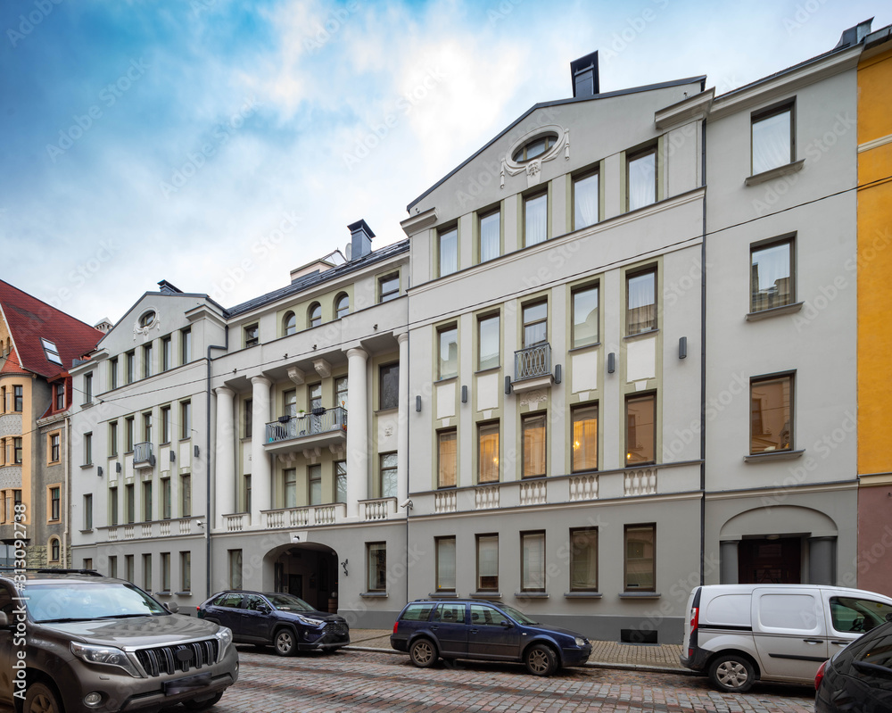 Modern buildings on the city street. Riga, Latvia. Car parking. Art Nouveau architecture.