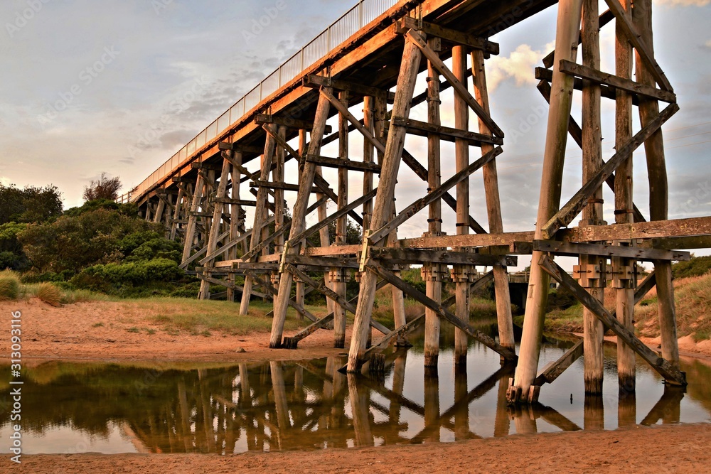 The heritage listed ex railway trestle bridge now part of the Bass Coast Rail Trail, over the Bourne Creek at Kilcunda on the Bass Coast in Southern Gippsland, Victoria, Australia