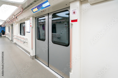 The empty interior of the subway car