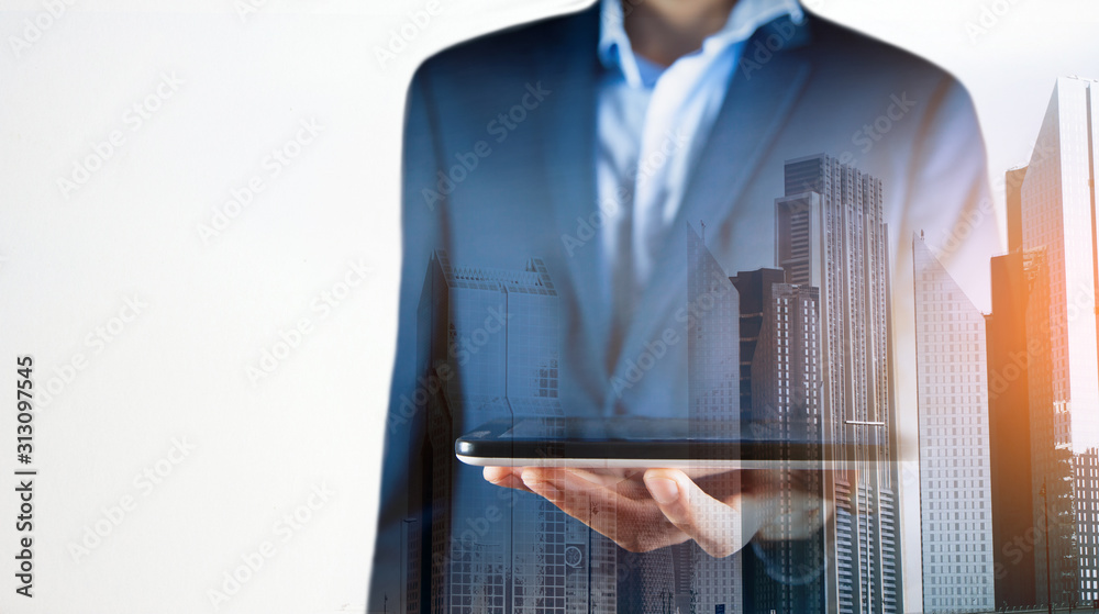 businessman holds tablet in hand businessman holds tablet in hand
