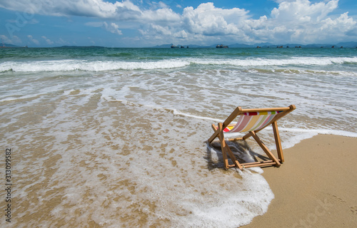 Deck chair at the tropical beach