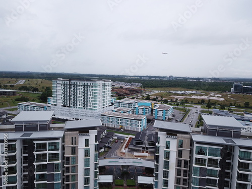 Kuching, Sarawak / Malaysia - January 3, 2020: The Tabuan Tranquility commercial area, condominium and residential houses photo