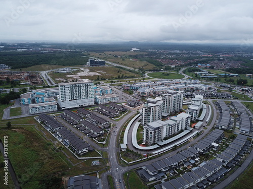 Kuching, Sarawak / Malaysia - January 3, 2020: The Tabuan Tranquility commercial area, condominium and residential houses photo