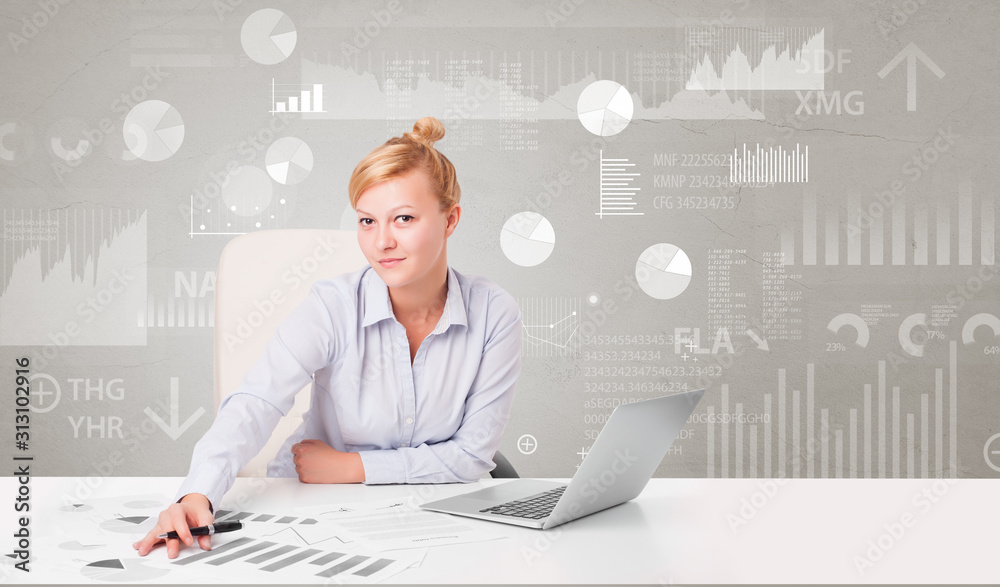 Business person sitting at desk with financial change, and report diagram concept Business person sitting at desk with financial change, and report diagram concept