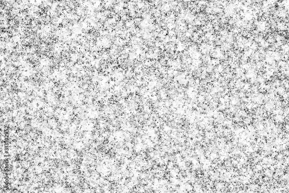Black and white mineral texture. Grain and noise design background for graphic design.