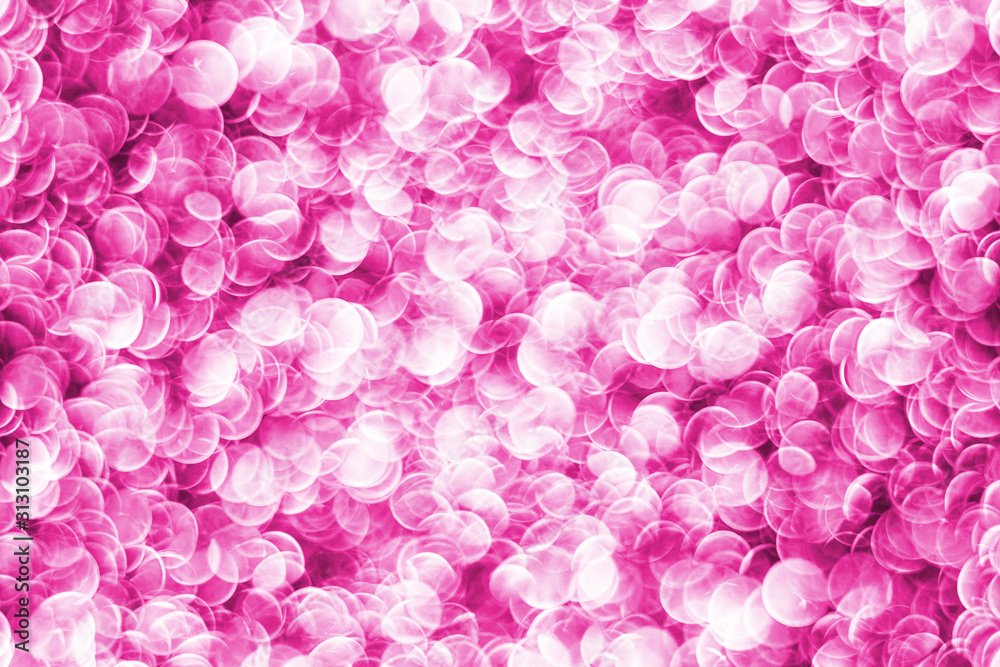 Pink bokeh shiny glitter background. Abstract vibrant color glowing white spots texture for graphic design.