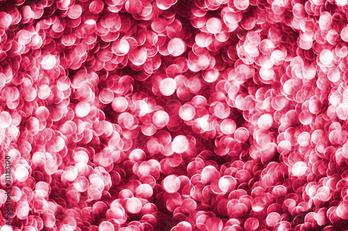 Fototapeta Naklejka Na Ścianę i Meble -  Pink bokeh shiny glitter background. Abstract vibrant color glowing white spots texture for graphic design.