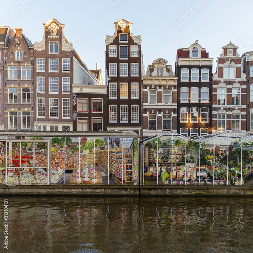 Canvas Print Amsterdam floating flower market and Singel canal