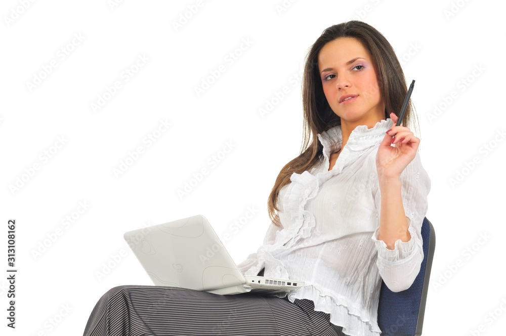 Woman sitting on chair with laptop on lap Woman sitting on chair with laptop on lap