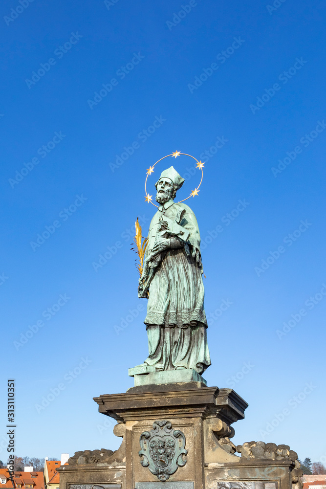 Statue of John of Nepomuk on the Charles bridge in Prague