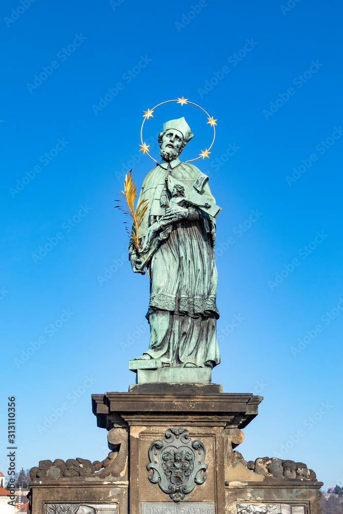 Statue of John of Nepomuk on the Charles bridge in Prague Statue of John of Nepomuk on the Charles bridge in Prague