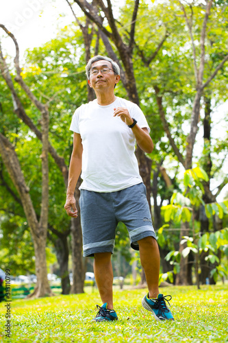 elderly old man exercise in the park