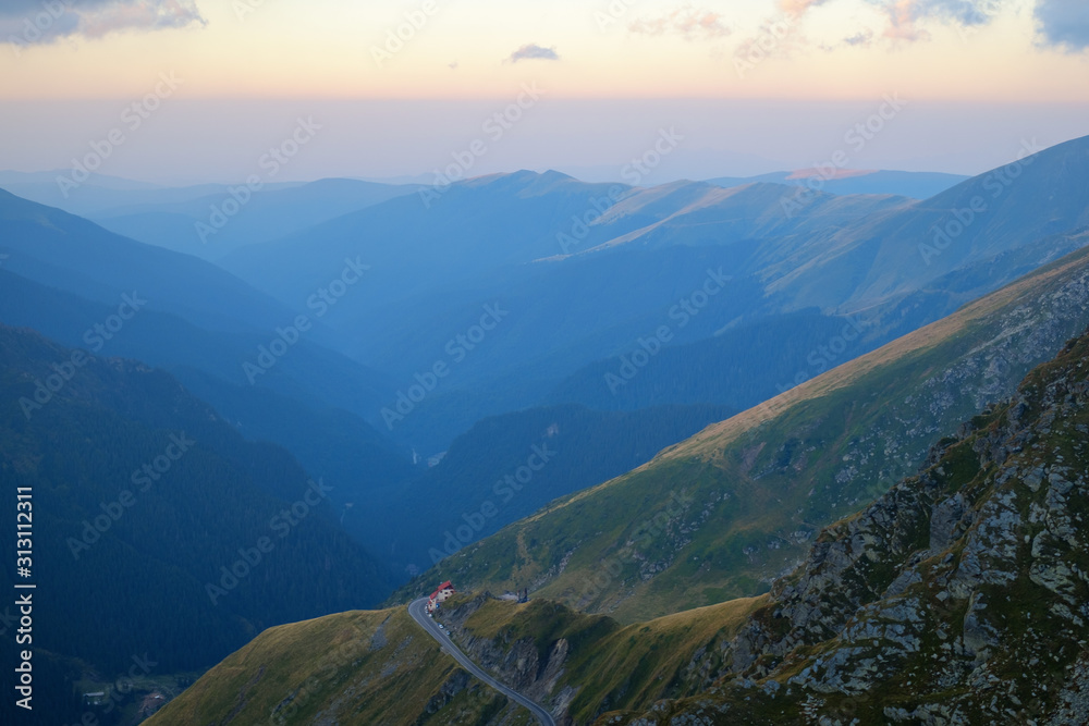 Obraz premium Sunrise on Fagaras high mountain ridge. Romanian mountain landscape with high peaks over 2200m