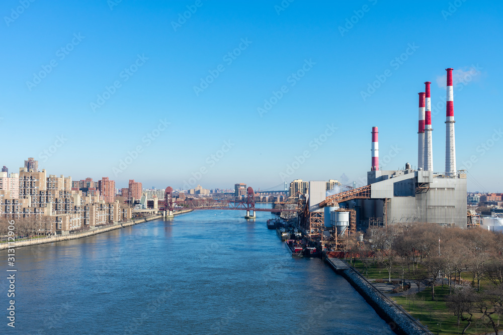 The East River Between Roosevelt Island and Long Island City with a Power Plant in New York City