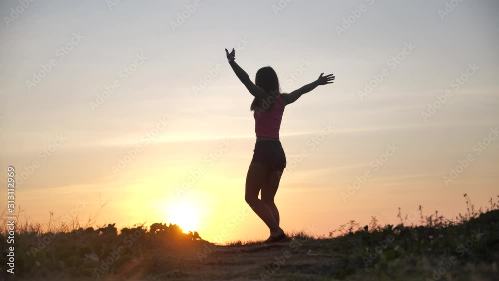 Happy woman jumping on beach enjoying sunset on summer travel vacation holiday. Happiness and bliss concept video with female jumping of joy celebrating in silhouette. SLOW MOTION 4k Happy woman jumping on beach enjoying sunset on summer travel vacation holiday. Happiness and bliss concept video with female jumping of joy celebrating in silhouette. SLOW MOTION 4k