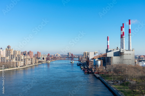 The East River Between Roosevelt Island and Long Island City with a Power Plant in New York City